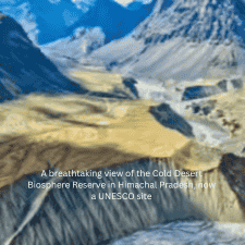 A wide panoramic shot of the stark, snow-dusted mountains and cold desert landscape of the Spiti Valley in Himachal Pradesh.